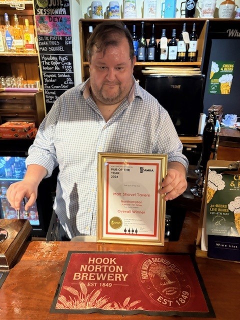 Tim Gilkes with his award